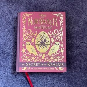 Disney The Nutcracker and the Four Realms Hardcover - Red & Gold